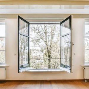 A room with an open window A room with an open window and a beautiful view from the window